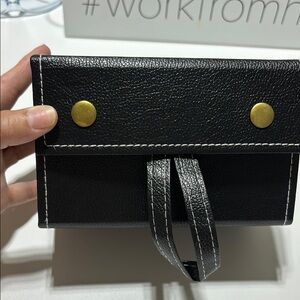 Elegant Black Faux Leather  Case for 5 Sunglasses with Gold Accents.